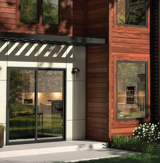 Exterior of home showing detailed door and black windows 