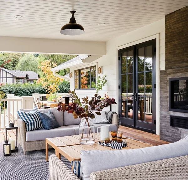 Back patio of home facing black outswing patio doors