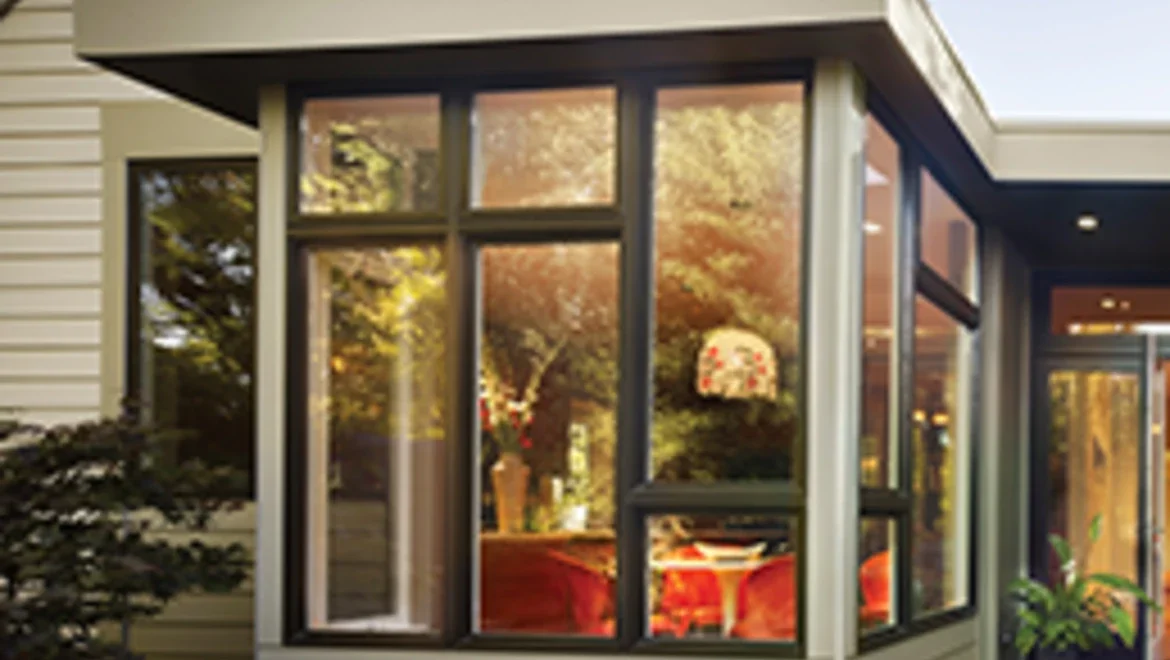 Exterior of home showing bronze window combinations