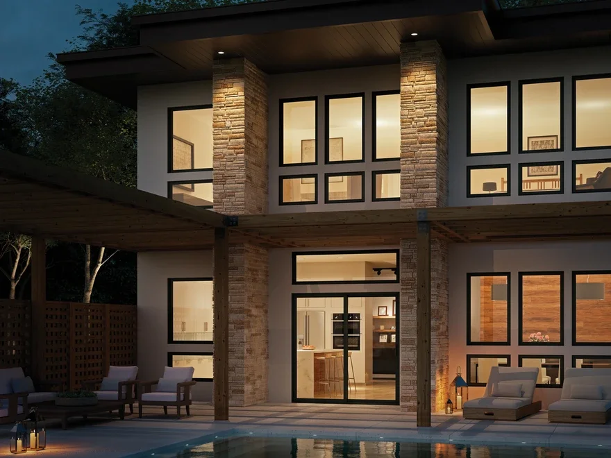 Two story home at dusk. You can see the lights in the house are on with black V300 windows and doors.