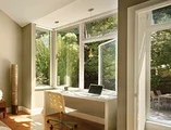 Office Space looking at white casement windows