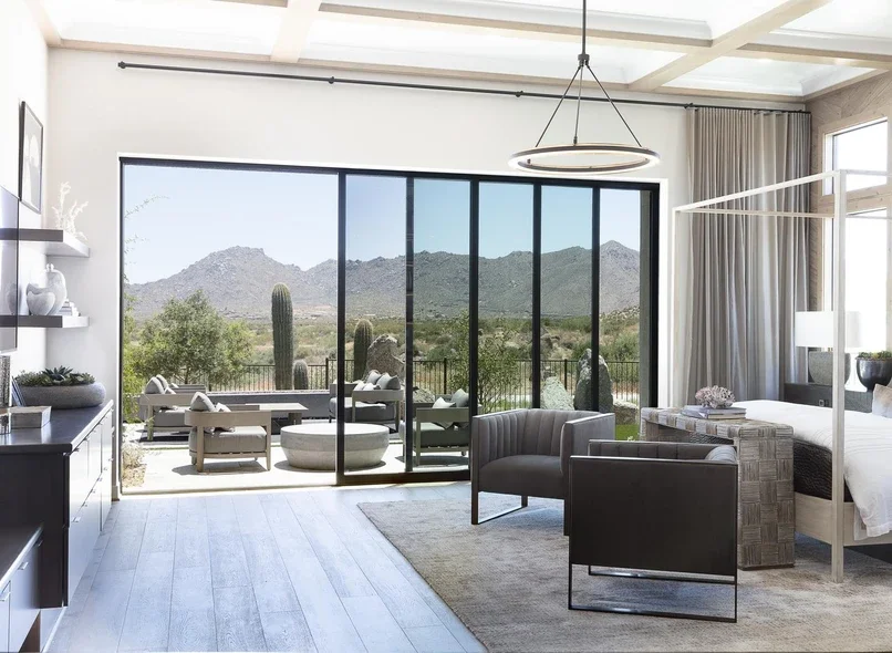 Covered front porch with a large window and glass door area