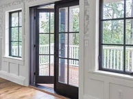 Outswing Patio Door and Casement Windows with Black Bean interior color and grid lines