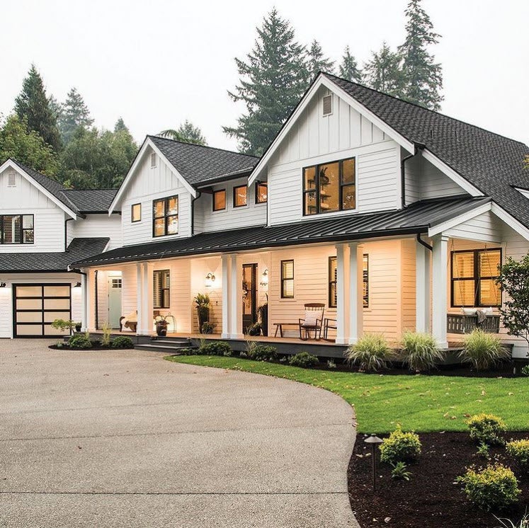 A Modern White Farmhouse with Black Windows A Modern White Farmhouse with Black Windows