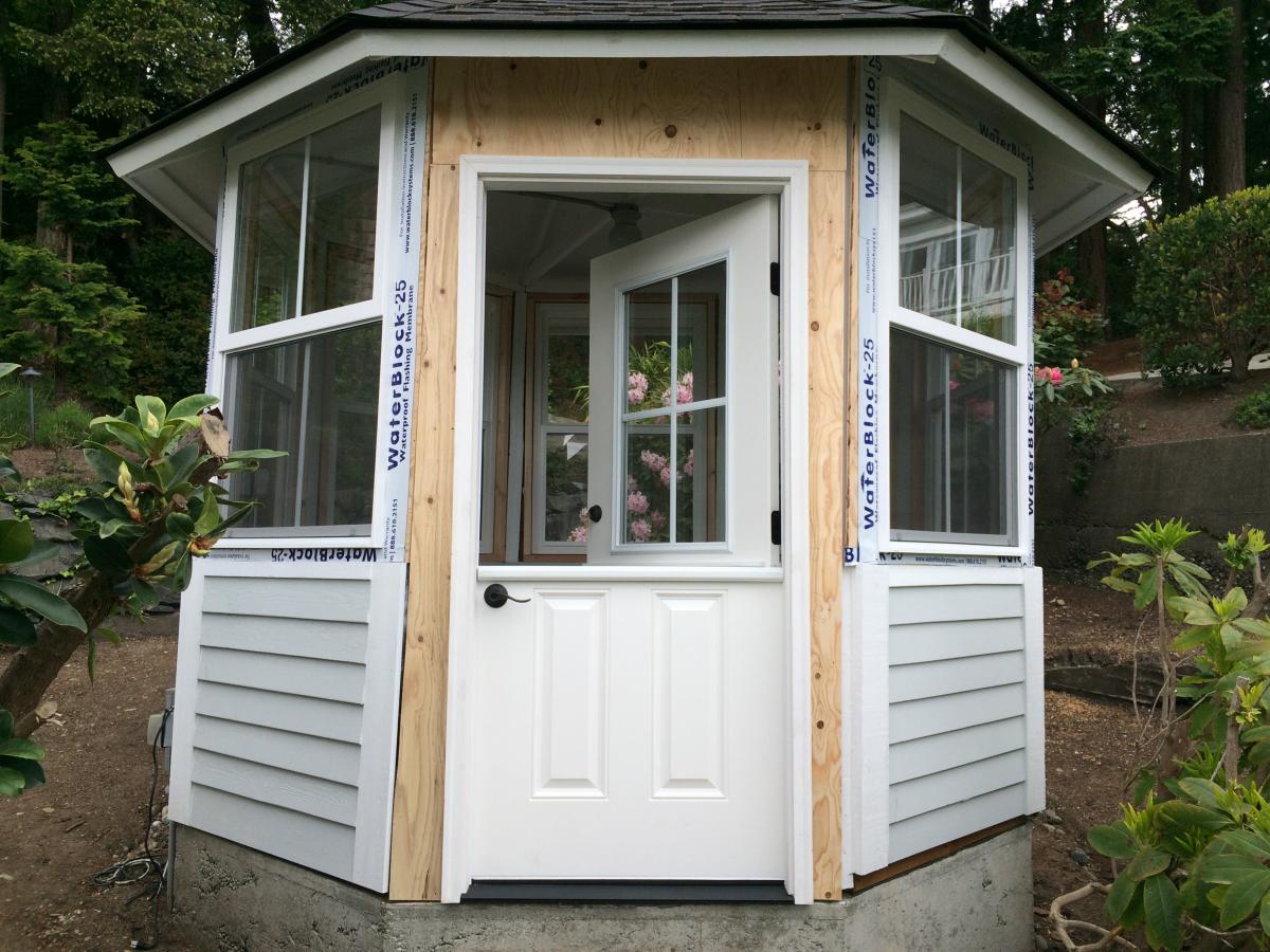 Greenhouse with vinyl windows