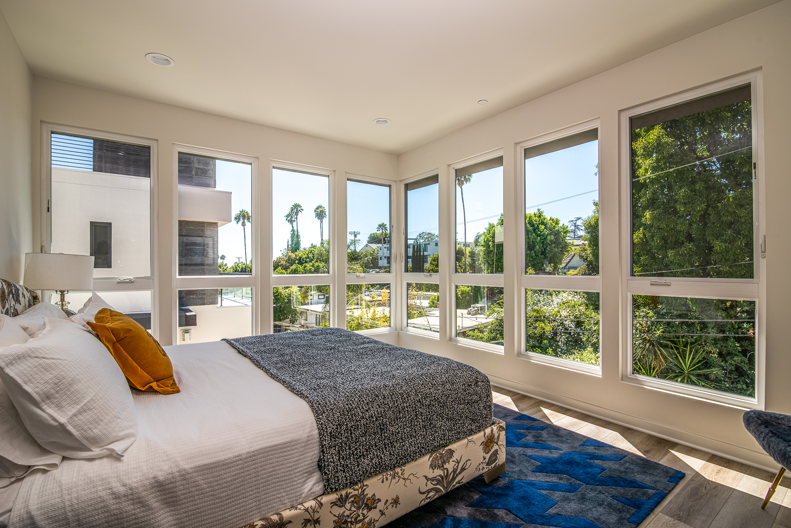 SJ Eaight complex featuring Milgard Tuscany Series vinyl windows in bedroom