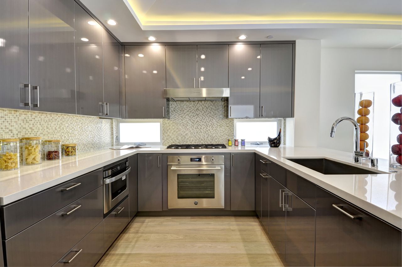 Kitchen with awning windows as back splash