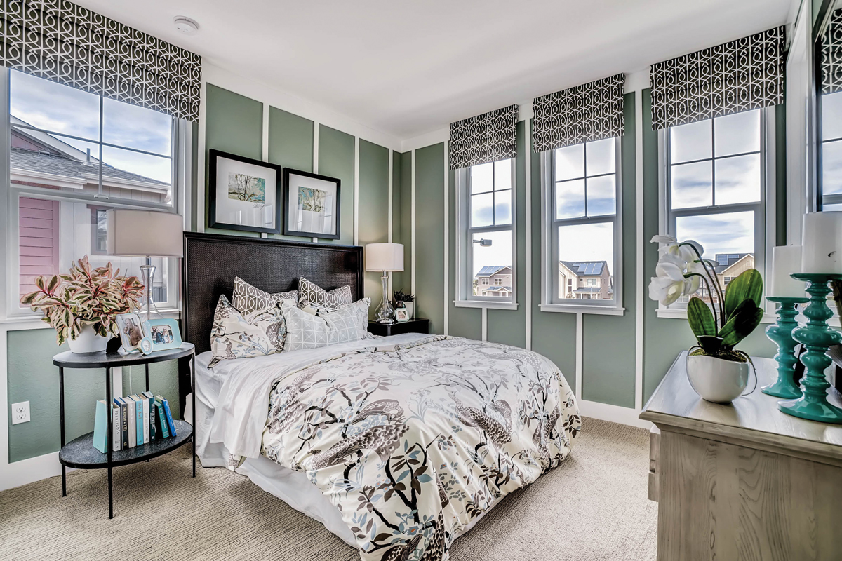 Bedroom with vinyl windows