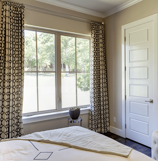 Bedroom facing casement windows