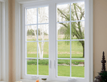 Bathroom facing white casement windows
