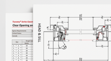 Stacked papers with technical drawings on the pages