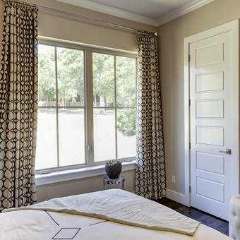 Bedroom facing casement windows