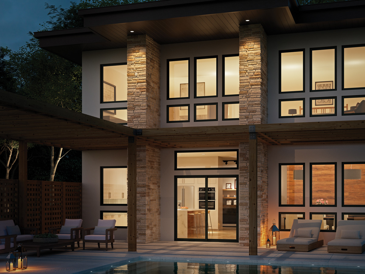 Two story home at dusk. You can see the lights in the house are on with black V300 windows and doors.