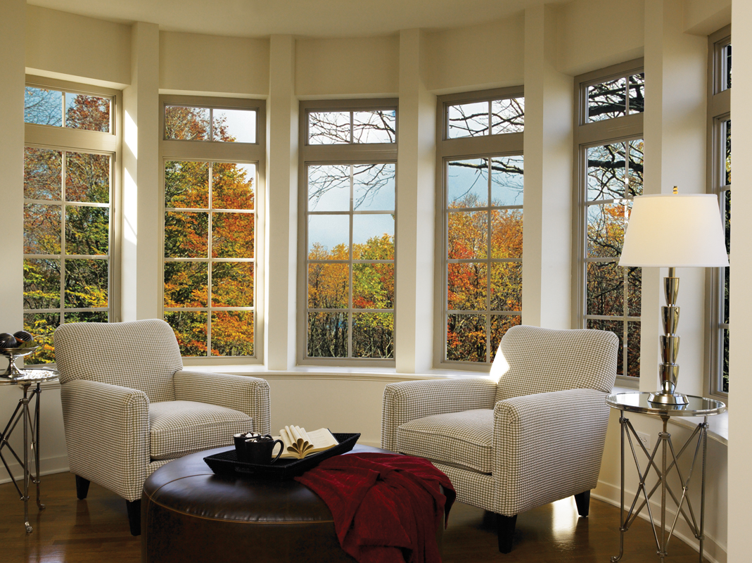 Tuscany® Series | V400 Bow Window with Grids overlooking fall foliage