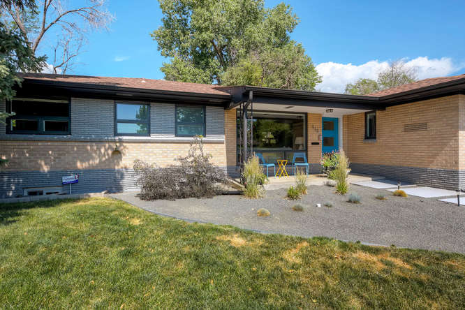 After photos of the home using bronze painted vinyl windows