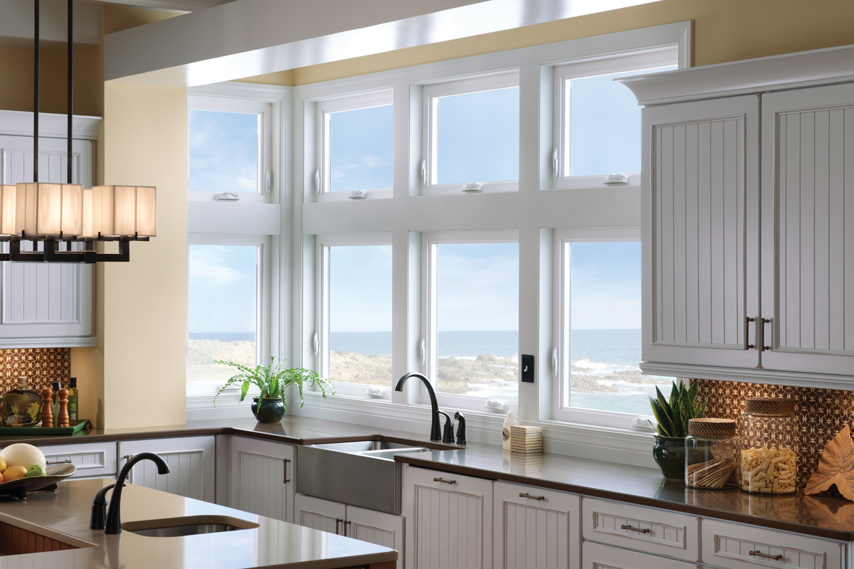  Stacking windows also add light into the room and can be a great focal point, if done correctly. This collection of windows includes awning and casement windows that are stacked to provide maximum natural lighting into the kitchen. 